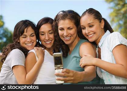 Women Photographing Themselves with Cell Phone