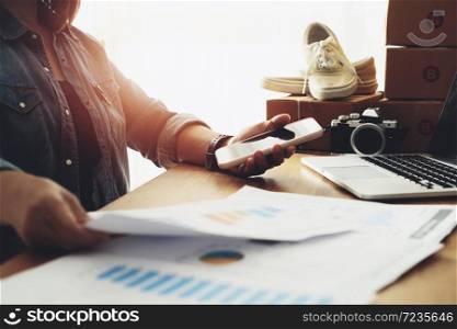 Women pointing at business document with on home office table, Online selling e-commerce shipping idea concept freelance start up small business owner