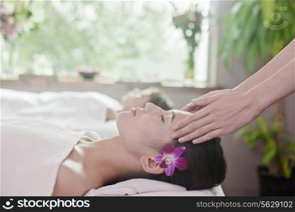 Women Receiving Head Massage