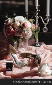 Women&rsquo;s accessories bride. Handbag, shoes, rings, bridal perfume close up. Women&rsquo;s accessories bride. Handbag, shoes, rings, bridal perfume