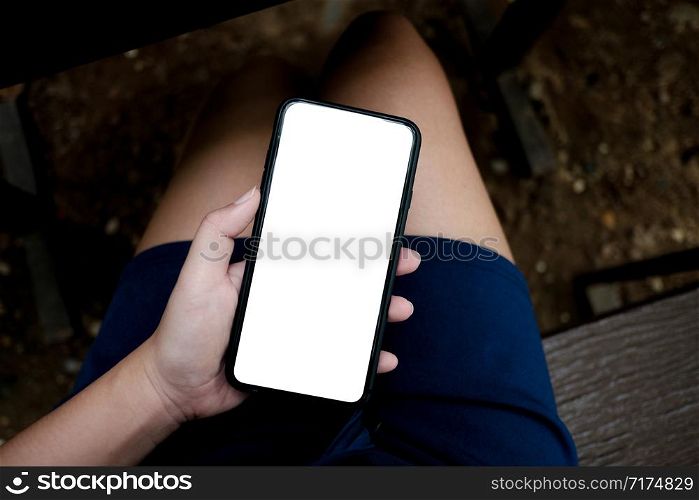 Women&rsquo;s hands holding cell telephone watching social media in a smart phone. social network concept with smart phone.