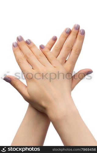 Women&rsquo;s hands, purple manicure with rhinestones. Isolate on white.