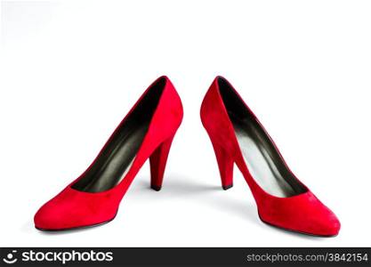 women&rsquo;s red velvet shoes isolated on white background