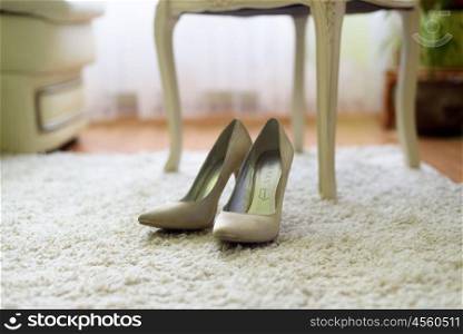 women&rsquo;s shoes on the floor on the carpet