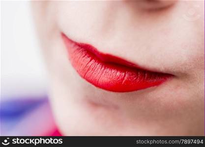 Women&rsquo;s thick lips painted red