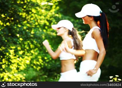 women run by sunny park alley