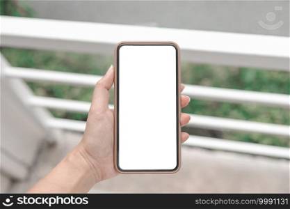 Women’s hands holding cell telephone blank copy space screen. smartphone  with blank white screen isolated. smart phone with technology concept