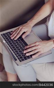 Women’s hands on a laptop keyboard. High quality photo. Women’s hands on a laptop keyboard