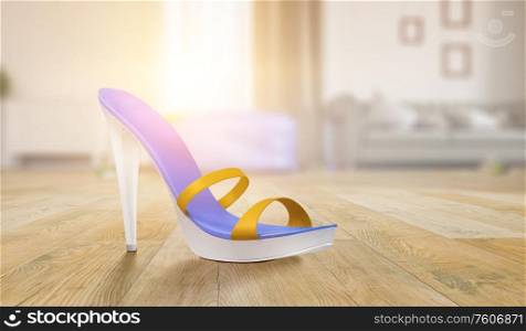Women`s sandal with high heel standing on a floor of a room. Women`s sandal with high heel