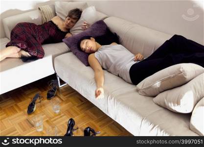 Women sleeping on sofa