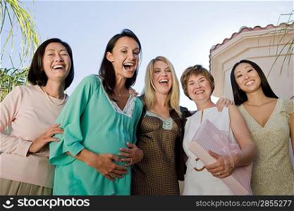 Women standing outside celebrating a Baby Shower