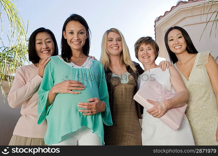 Women standing outside celebrating a Baby Shower