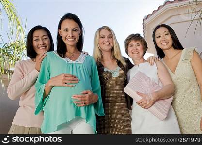 Women standing outside celebrating a Baby Shower