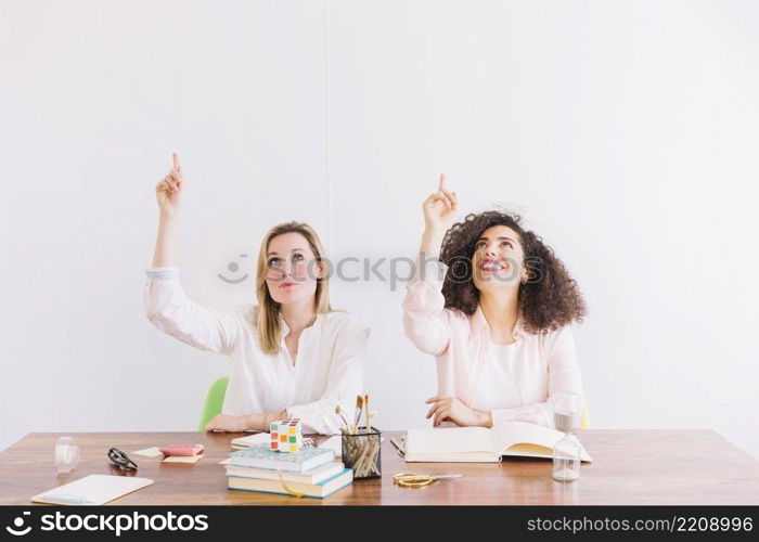 women table pointing up