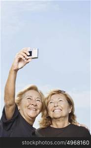 Women taking a picture of themselves