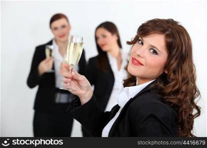 Women toasting with champagne
