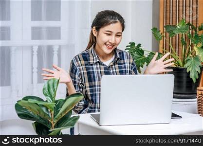 Women use laptops in the office with pleasure.