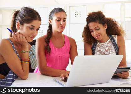 Women Using Laptop In Modern Office Of Start Up Business