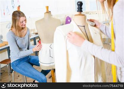 women using mannequins to create garments