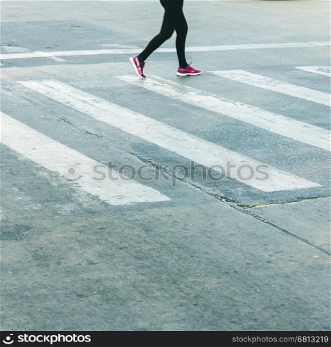 women walk on crosswalk