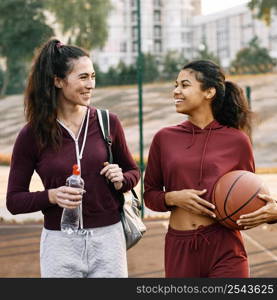 women walking home after basketball game