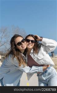 women wearing sunglasses outdoors