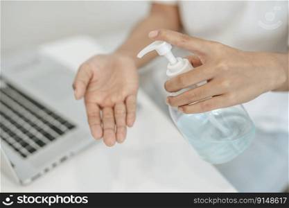 Women wearing white shirts that press the gel to wash hands to clean hands.