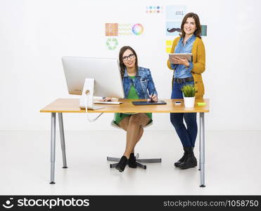 Women working at desk In a creative office, team work