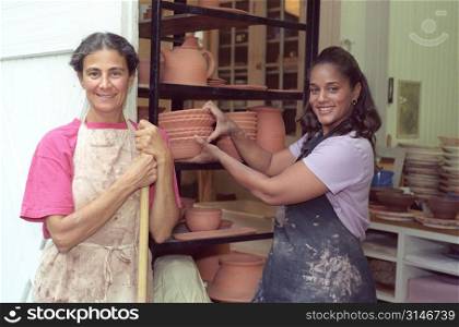 Women Working In A Pottery Studio