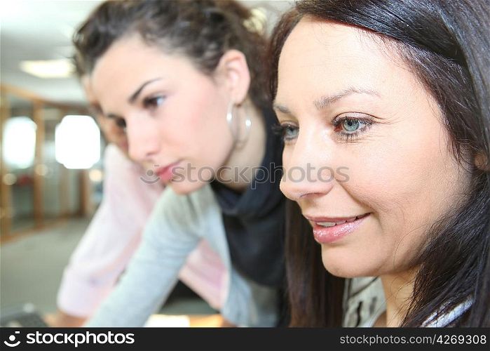 Women working on a project together