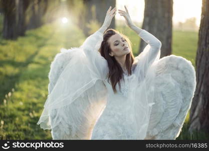 Wonderful angel dancing in the wild forest