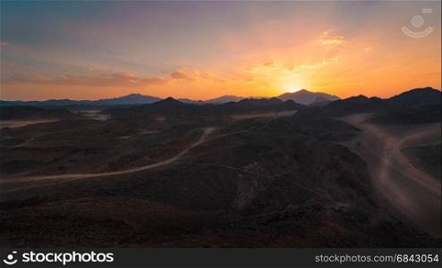 Wonderful landscape,Arabian desert of stone, Egypt with mountains at sunset.