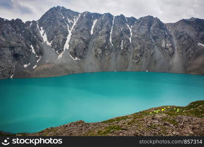 Wonderful mountain landscape (lake, highland, peak, beauty world) Picturesque view near Alakul lake in Terskey Alatoo mountains, Tian-Shan, Karakol, Kyrgyzstan