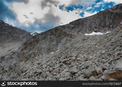 Wonderful mountain landscape with stone rocks, peaks). Picturesque view near Adygine lake in Kyrgyz Alatoo mountains, Tian-Shan, Kyrgyzstan.. Wonderful mountain landscape with stone rocks, peaks).