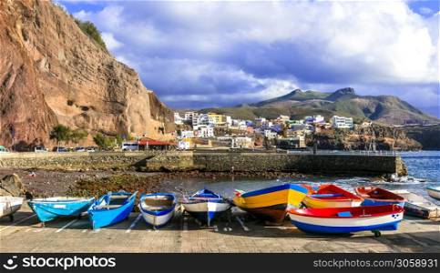 Wonderful scenery of Grand Canary island. view of Puerto de Sardina village and colorful fishing boats
