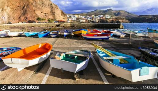 Wonderful scenery of Grand Canary island. view of Puerto de Sardina village and colorful fishing boats