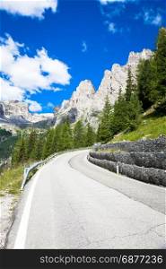 Wonderful sunny day with blue sky background; road in Dolomiti Region, North-East Italy