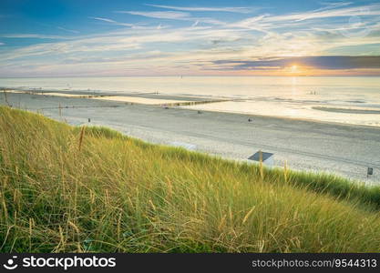 Wonderfull sky during the sunrise over the dutch beaches of the province of Zeeland. Mesmerizing seascape during sunset in Zeeland, The Netherlands