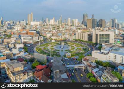 Wongwian Yai roundabout. Aerial view of highway junctions. Roads shape circle in structure of architecture and technology transportation concept. Urban city, Bangkok, Thailand.