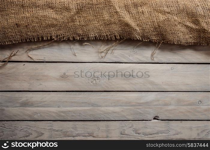 Wood background with sack textile