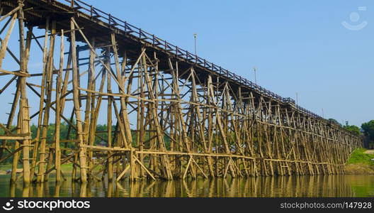 Wood bridge with river and mountain in Kanchanaburi Thailand