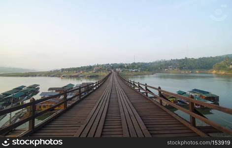 Wood bridge with river and mountain in Kanchanaburi Thailand