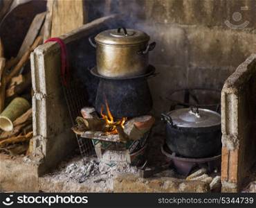 Wood burning stove in traditional kitchen, Chiang Rai, Thailand