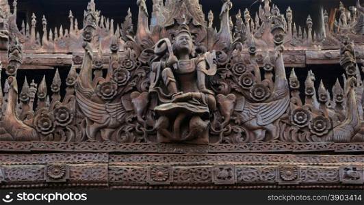 Wood carving detai at Shwe In Bin Kyaung in Mandalay, Myanmar