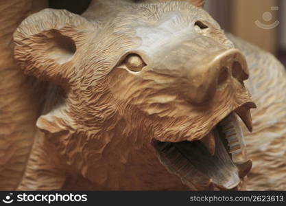 Wood carving of a bear