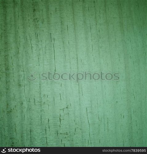 Wood. Closeup of green wooden wall with vignette as background or texture