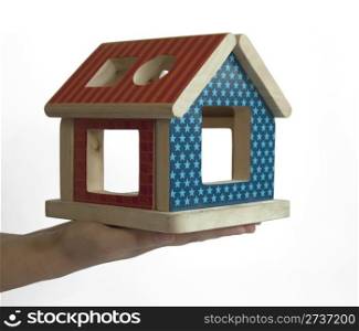 Wood colorful house toy in hand