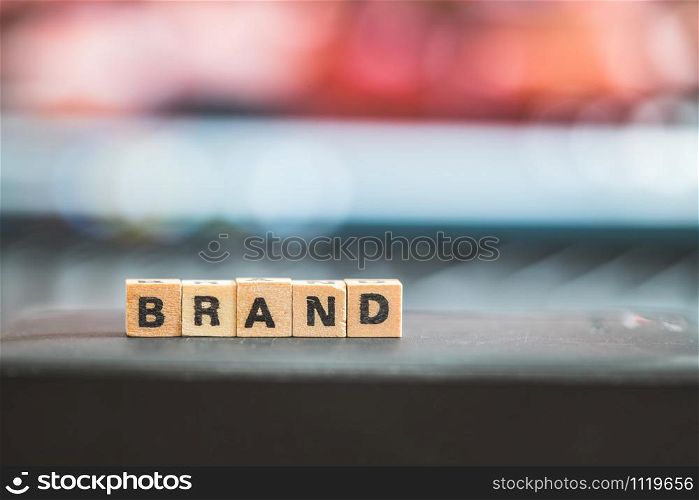Wood cubes with the word ?Brand?, close up picture with copy space. Identity, Marketing, Business