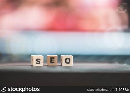 Wood cubes with the word ?SEO?, close up picture with copy space. Search engine optimization.