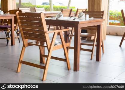 Wood dining table for food preparation equipment is ready.